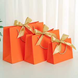 Luxury Paper Gift Tote Bag Custom Logo Printing <b>Wedding</b> Birthday Gift Packaging Shopping Bags with Golden Satin <b>Ribbon</b> Bow - Product Image 1