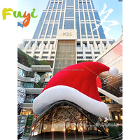 Chapeau de Père Noël gonflable géant commercial pour décoration de Noël et affichage publicitaire extérieur