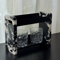 Étagère de rangement à deux niveaux en marbre noir naturel, design moderne, surface polie, construction durable pour cosmétiques et parfums de bureau