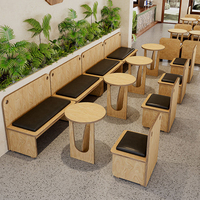 Ensemble de mobilier de café Wabi Sabi : banquette, table basse ronde et chaise individuelle pour salon de thé ou restaurant
