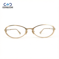 M10313 Monture de lunettes pour femme œil de chat, monture intégrale en métal, branches ajourées à double maillon unique, monture optique ovale vintage