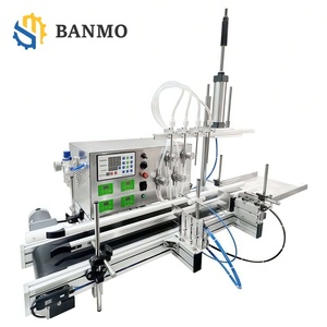 Machine <span class=keywords><strong>de</strong></span> remplissage automatique <span class=keywords><strong>de</strong></span> liquides à 4 têtes <span class=keywords><strong>de</strong></span> haute précision pour le conditionnement <span class=keywords><strong>de</strong></span> cosmétiques, parfums, huiles essentielles, gels, encres et solvants - Product Image 1