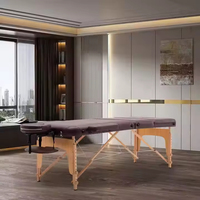 Großhandel Bestseller Klappbare Verstellbare Leder-Massageliege Tragbare Holzbein-Massageliege für Schönheitssalons