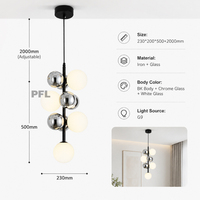 Lustre contemporain en verre à bulles moléculaires verticales longues, en métal noir, style crème minimaliste sombre pour hall d'entrée