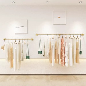Perchero de pared tipo boutique, de acero inoxidable dorado, que ahorra espacio, con barra única, para exhibición de ropa en tiendas de mujer, ODM - Product Image 2