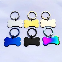 Porte-clés tendance en acier inoxydable, forme d'os avec empreinte de patte mignonne, gravure personnalisée, anti-perte, finition brillante, avec anneau fendu
