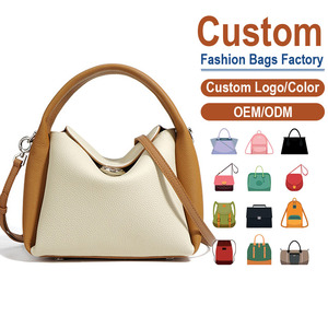 Bicolor Genuine Leather Crossbody Bag 100% Full-Grain <b>Pebbled</b> Cowhide, Crafted with Two-Tone Paneling Fine Grain Surface - Product Image 1