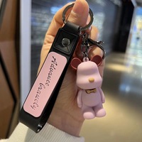 Porte-clés créatif en PVC en forme d'ours en peluche avec nœud papillon, pour voiture, couple, ou sac à dos, léger et écologique