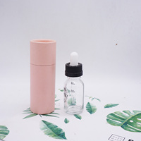 Flacon compte-gouttes en verre ambré personnalisé de 100ml Flacons compte-gouttes d'huile essentielle d'huile de barbe noire de 100ml avec tube d'emballage en papier