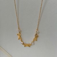 Ensemble collier et bracelet tendance pour femme avec nœud papillon et zircon - Acier inoxydable plaqué or 18 carats, résistant à l'eau et inaltérable, cadeau idéal pour les fêtes