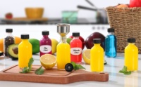 Bouteilles en verre miniatures de 60 ml avec couvercle à vis en métal, bouteilles transparentes pour jus, shots de gingembre, huiles essentielles, approvisionnement en gros auprès du fabricant