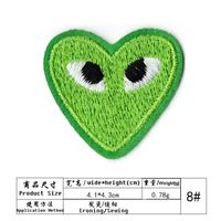 Lot d'accessoires de vêtements DIY de différentes couleurs, appliques brodées, patchs thermocollants brodés en forme de cœur et d'œil de dessin animé