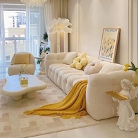 Canapé une place en tissu nordique de style français, couleur crème, en forme de guimauve, petit format, design tendance, en laine d'agneau, rembourré en éponge