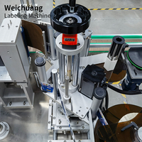 Machine d'étiquetage entièrement automatique pour bouteilles d'eau minérale, bouteilles de bière rondes en plastique et bidons d'huile comestible