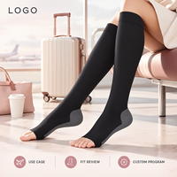 Chaussettes de compression à compression graduée pour mollets, noires, avec tableau de tailles, manchette plus large, bout plat, composition du tissu, instructions d'entretien et emballage