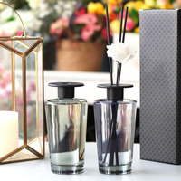 Flacon de parfum de luxe en verre 500 ml, grand diffuseur à bâtonnets d'arôme floral noir clair avec sérigraphie personnalisable
