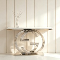 Table console de luxe à double anneau entrelacé avec base sur piédestal, plateau en marbre, table d'entrée en acier inoxydable, table de décoration artistique moderne