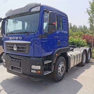 Camion tracteur d'occasion Sinotruk HOWO TX 380HP 10 roues 6X4 pour transport longue distance avec cabine HOWO76 climatisée conduite à gauche - Product Image 1