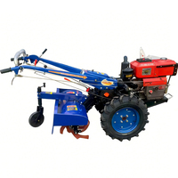 Tracteur à deux roues Solis avec chargeur frontal et accessoires de labour, moteur 10 CV, usage agricole, pneus 12.4/28