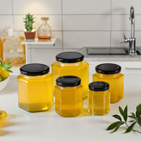 Grosir kustom logo heksagonal Jam kaca botol madu botol makanan dapur dengan tutup logam