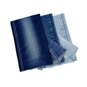 Stock OE Twill Jeans Fabric Slub Denim Fabric Mid-elastic Jean Fabric With White Yarn For Clothes Manufacturer With Wholesale