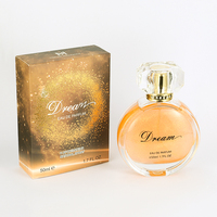 Damenparfüm in Kugelförmigem Glasflakon mit Bernsteinfarbener Flüssigkeit, Goldener Verschluss, Strahlender Bronze-Verpackung, Fantasievolle Geburtstags-Edition mit Langanhaltender Duftnote