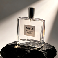 Bouteille de parfum vide en verre transparent de 100 ml avec étiquette personnalisée, paroi épaisse, épaule plate, forme rectangulaire carrée