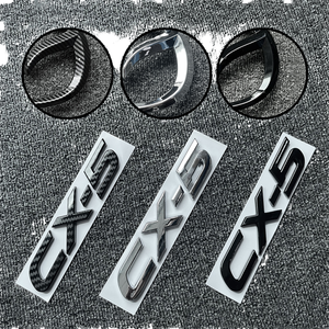 Emblema frontal de maletero Upauto CX-5/CX-50/CX30, de plástico ABS 3D, de un solo uso, para reemplazo de carrocería, distintivo para volante, pegatina trasera - Product Image 1