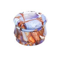 Vente en gros de broyeur d'herbes sèches à 4 couches Accessoires pour fumeurs personnalisés Broyeur manuel en métal de 63mm avec logo personnalisé OEM