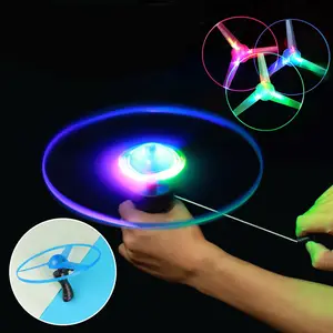 2022 Funnny Cool Popular Outdoor Playing Plastic Pull String Spinning Line Led Flashing Light Up Flying Saucer Disc Ufo Kid Toys