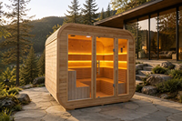 Ruang Sauna Rumah Terbuka dengan Kabin Kaca dan Interior Kayu untuk Spa di Halaman Belakang, Retret Taman, dan Penggunaan Wellness Resort