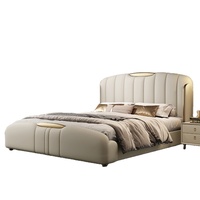 Lit double en bois massif de luxe léger en cuir de luxe Ensemble de meubles de chambre à coucher avec dossier rembourré