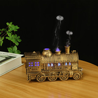 Diffuseur ultrasonique d'huile essentielle de minuterie d'eau de bureau à la maison de forme de train avec la LED