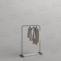 Solution d'aménagement de magasin Kainice : Rails, comptoirs îlots, présentoirs de magasin, présentoirs de table en métal et acrylique pour boutique de vêtements pour hommes