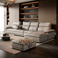 Canapé inclinable électrique moderne en cuir véritable beige en forme de L avec console centrale, personnalisable OEM pour concessionnaires, prix d'usine en gros