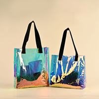 Sacs-cadeaux en plastique holographique de haute qualité avec poignées Sacs à provisions transparents pour tampons directement du fabricant
