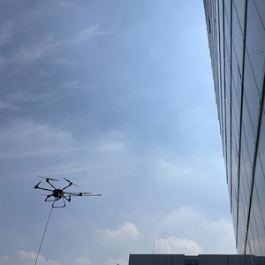 Advanced Cleaning Drone Tethered Drone Building Washing Drone for Windows and Solar Panels Strong Safety High Performance - Product Image 1