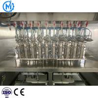 Machine de remplissage d'huile automatique multi-têtes pour bouteilles en plastique (huile d'arachide, d'olive, de tournesol)