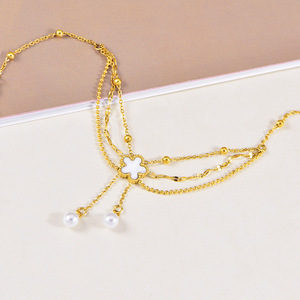 Nouvelle <span class=keywords><strong>Chaîne</strong></span> <span class=keywords><strong>de</strong></span> <span class=keywords><strong>Cheville</strong></span> Femme Tendance en Acier Inoxydable, Coquille Blanche, Fleur à Cinq Feuilles, Pompon et Perle, Triple Couche, Bijoux - Product Image 4