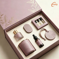 Boîte en carton rigide magnétique de luxe personnalisée pour emballage de bougies parfumées, de parfums solides et d'huiles essentielles avec insert en mousse personnalisé