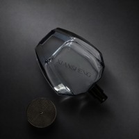 Flacons de parfum de luxe personnalisés 100 ml en verre facetté vides avec bouchon en alliage de zinc et emballage en boîte OEM ODM Fabricant