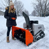 Déneigeuse télécommandée VOER sur chenilles, largeur 1000 mm, moteur essence 15 CV, pour le déneigement des propriétés municipales et des cours d'usine