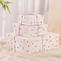 Boîte cadeau rigide personnalisée en carton pour emballage de détail et de marque avec ruban et couvercle