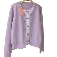 Vente en gros Offre Spéciale manteau chaud en cachemire pour femmes cardigan à nœud ample à manches longues et à simple boutonnage deux pièces chaudes pour les chandails pour femmes