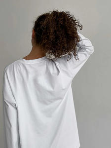 Camiseta Holgada de <span class=keywords><strong>Manga</strong></span> Larga de Moda, Color Sólido Simple, Estilo Urbano, 100% Algodón de Alta Calidad, Colección Primavera 2025 - Product Image 1