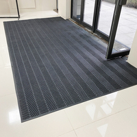 Tapis de sol commercial moderne de luxe fait main, rembourré, avec dos en caoutchouc antidérapant, lavable, en polypropylène, pour hôtel étoilé, motif pneu