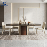 Ensemble de table à manger en pierre frittée Table à manger extensible en usine de Guangdong Foshan pour 8 chaises avec base en acier au carbone