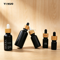 Emballage d'huile essentielle imprimé à l'écran de luxe, 5 ml/10 ml/15 ml/20 ml/30 ml/50 ml/100 ml, flacon en verre noir mat pour sérum cosmétique
