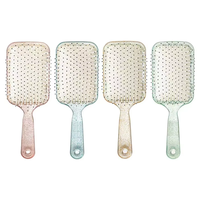 Peigne rond en nylon à dents larges pour le massage du cuir chevelu et le coiffage des cheveux, avec poignée à coussin d'air respirant et design suspendu, grand peigne pour filles