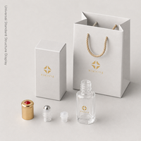 Flacon roll-on carré en verre transparent de 10 ml avec bouchon doré et capuchon rouge, contenant pour huile de parfum avec boîte cadeau